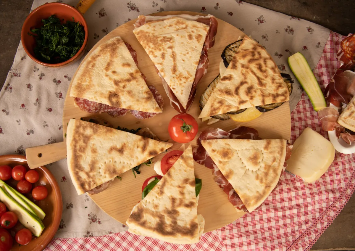 La Crescia di Gubbio: dal pane sacro degli Antichi Umbri al simbolo gastronomico della famiglia eugubina